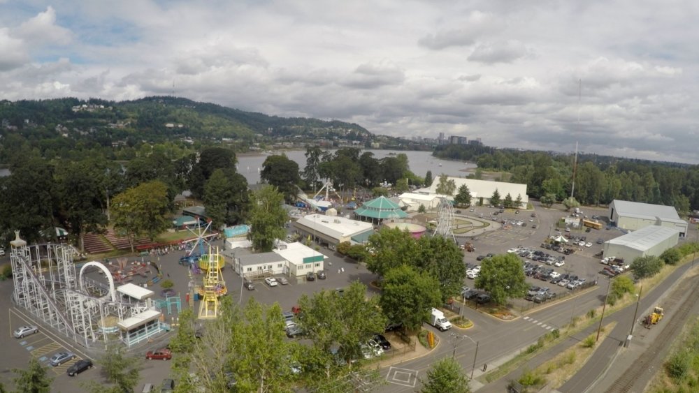 Aerial view of an amusement park, example of an activity often offered in ticketing