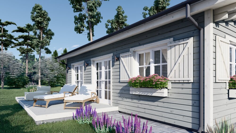 Chalet en bois habitable gris avec terrasse, grandes fenêtres et volets blancs